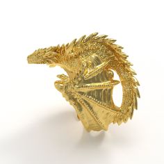 Introducing our Dragon Themed Gold Ring - a unique piece of jewelry that symbolizes power, wisdom, and the magic of mythology. This ring is not just an accessory, it's a tangible connection to the world of fantasy and lore. Our ring is skillfully crafted from high-quality gold, ensuring durability and a timeless appeal. The centerpiece of this ring is the Dragon design, intricately crafted to capture the essence of this mythical creature, symbolizing strength and majesty. This ring is more than Handmade Fantasy Jewelry For Ceremonial Occasions, Handmade Fantasy Jewelry For Ceremonial Use, Gold Fantasy Jewelry With Dragon Design, Magical Gold Ring Jewelry, Fantasy Gold Jewelry With Dragon Design, Fantasy Jewelry With Unique Design For Gift, Mystical Gold Ring Jewelry, Collectible Fantasy Jewelry With Dragon Design, Collectible Dragon Design Jewelry Ring