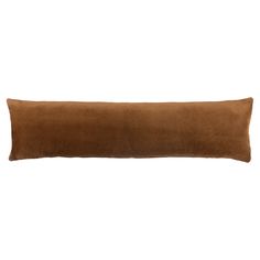 a brown pillow on a white background