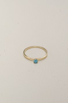 Discover elegance with our 14K Solid Gold Natural Blue Stone Ring. A blend of luxury and simplicity, this piece is your everyday companion to tranquility and style. Ideal for tastemakers. Shop now to elevate your daily wear. Elegant Turquoise Rings In 14k Gold, Minimalist Turquoise Promise Ring With Birthstone, Elegant Turquoise Birthstone Ring, Blue 14k Gold Stackable Rings As Gift, Minimalist Stackable Blue Jewelry, Modern Blue Birthstone Ring For Gift, Classic Blue Stackable Rings For Gift, Blue Stackable Birthstone Ring With Round Band, Classic Blue Gemstone Stackable Rings