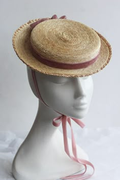 FiFi Straw Canotier. Crafted in premium fine grade milan straw braid. A chic, elegant and uncluttered stylish hat trimmed with pink silk velvet ribbon necktie. Fifi canotier is professionally finished with a pretty vintage straw ruffle edge. This attention to detail and finishing adds everlasting quality. The hat is set in place on the head with adjustable millinery elastic and/or long pure silk neckties.  SHIPPING All shipments will be sent via DHL All Worldwide parcels will arrive within 2-3 w Chic Fitted Natural Straw Hat, Formal Summer Beige Straw Hat, Spring Formal Straw Hat, Formal Fitted Beige Straw Hat, Classic Adjustable Straw Hat For Weddings, Elegant Woven Straw Hat, Elegant Natural Straw Hat For Garden Party, Classic Straw Hat For Spring Wedding, Elegant Adjustable Woven Straw Hat