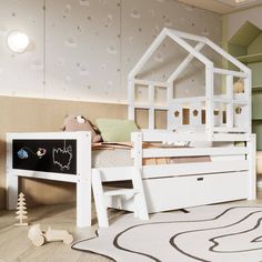 a child's bedroom with a white bed and toy house on the floor next to it