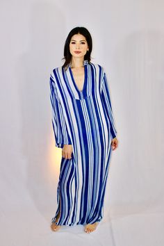 Low front, bell sleeve, maxi caftan. Deadstock semi-sheer blue & white rayon & cotton blend fabric. No lining. Striped Long Sleeve Maxi Dress For Vacation, Blue Chic Kaftan For Summer, Chic Blue Kaftan For Summer, Blue Long Sleeve Maxi Dress For Vacation, Chic Blue Kaftan For The Beach, Blue Maxi Dress For Daywear, Blue Summer Daywear Kaftan, Summer Blue Kaftan For Daywear, Blue Kaftan For Summer Daywear