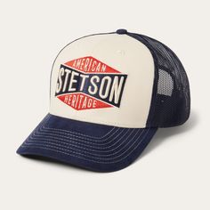 This rugged trucker cap features a Stetson American heritage logo on its rugged brushed cotton canvas front. It has a traditional mesh back for breathability and ventilation, a gently curved bill and a classic snapback closure to ensure a secure, adjustable fit. Truckers throughout the 20th-century wore caps branded with their company’s logo — by the ‘70s, they had evolved into the hat we know and appreciate today. Practical, proud, and pure Americana, the trucker hat is a true classic. 3 7/8" C Cotton Trucker Baseball Cap, Six-panel, Cotton Trucker Baseball Cap With Curved Bill, Cotton Trucker Baseball Cap, Vintage Cotton Trucker Hat With Curved Bill, Vintage Cotton Trucker Hat With Curved Visor, Made In Usa Trucker Baseball Cap For Outdoor, Trucker Baseball Cap Made In Usa For Outdoor, Outdoor Trucker Baseball Cap Made In Usa, Trucker Style Cotton Baseball Cap With Logo Patch