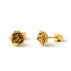 Gold Rose Earrings, Rose Earrings, Gold Jewelry Beautiful handcrafted rose earrings, add a touch of elegance to any outfit. They would make a perfect anniversary gift. * Material: 18ct Rose or Yellow eco-gold * Size of Rose: Approx. 0.8cm (0.3in) diameter * Finish: Choose from: * 18ct rose and yellow gold * 9ct rose and yellow gold * Earring Type: Stud Earrings with butterfly back * Ready to Ship in 10 business day * Made in the United Kingdom Please allow for slight variations in size as these Elegant Gold Rose Flower Earrings, Gold Rose Flower Earrings, Gold Earrings With Roses, Formal Rose-design Rose Earrings, Formal Gold Earrings With Rose Design, Elegant Formal Jewelry With Roses, Formal Rose Earrings With Rose Design, Luxury Floral Cluster Earrings As Gift, Elegant Formal Jewelry With Rose Details