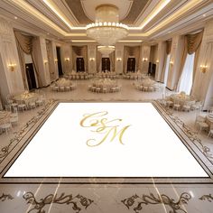 an empty ballroom with tables and chairs