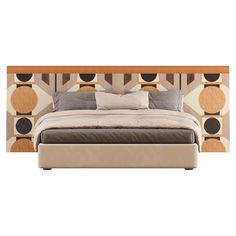 a large bed sitting in front of a wall with circles on it's headboard