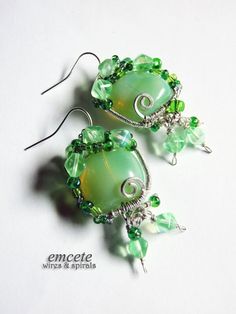 the earrings are made with green glass beads