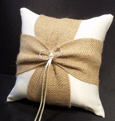 the ring pillow is tied up and ready to be used as an accent piece or decoration