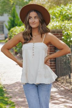 Our Natural Lace Button Front Top is so lightweight & breathable! It's made out of woven cotton gauze fabric, making it perfect for summer! Free US shipping! Feminine Cotton Camisole For Vacation, Beige Camisole For Beach, Bohemian Summer Top With Button Closure, Bohemian Beach Tops With Button Closure, Feminine Tops With Buttons For Vacation, Feminine Buttoned Tops For Vacation, Feminine Vacation Tops With Buttons, Bohemian Tops With Adjustable Straps For Spring, Feminine Cotton Camisole For Beach