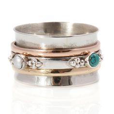 Rajput Turquoise and Pearl Silver Spinning Ring by Charlotte's Web | Charlotte's Web Different Rings, Hammered Silver Jewelry, Spinning Ring, Spinning Rings, Silver Spinner Rings, Jewellery Shop, Spinner Rings, Metal Clay, Ring Ideas