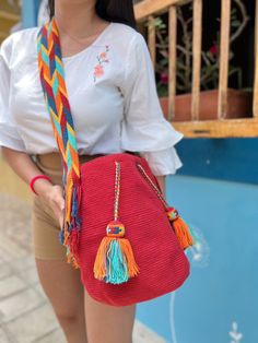 Red Wayuu Mochila Bag with Special Tassels - Large Size : 25x29cm (Large) Strap : 100cm (crossbody) - 🌟Shipping: DHL : * USA, Central & North America: 2-3 Business Days * Rest of The World: 4-6 Business Days - - - ⭐️ Best of Colombia is the House to More Than 300 Artesans From all Around Colombia. Your Support Means Alot To Us & To Them. - If you Have Any Question or Wish To Acquiere Our Products Wholesale ; Please Feel Free To Reach Us At AnyTime Either On Etsy Message we are Available Almost Daily Use Crossbody Bucket Bag With Tassels, Daily Crossbody Bucket Bag With Tassels, Casual Red Crochet Bag With Adjustable Strap, Red Woven Satchel Bag, Red Casual Crossbody Bucket Bag, Casual Red Crossbody Bucket Bag, Daily Use Bucket Shoulder Bag With Tassels, Travel Bucket Bag With Tassels And Crossbody Shape, Travel Crossbody Bucket Bag With Tassels