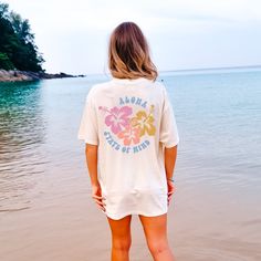 Say "Aloha" with the Comfort Colors Aloha Shirt. This Hibiscus tee is perfect for beach lovers and those who want to embrace the summer vibes with its tropical and sun-inspired design.Experience the essence of Aloha with our vibrant Hibiscus Tee Hawaii shirt. Crafted with the highest quality Comfort Colors® fabric, embrace the summer vibes with the iconic hibiscus flower design, making it the perfect Beach Shirt for your sunny adventures. Elevate your wardrobe with this must-have Summer Tee and Hawian Shirt, Flower Shirt Design, Cute Baby Tees, Hibiscus Flower Design, Sun Shirt, Baby Tees, Comfort Colors Shirt, Hibiscus Flower, Beach Shirt