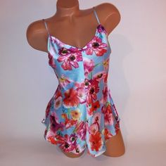 Victoria Secret Lingerie One Piece Romper Small Blue Pink Floral Tie Back Wireless Sleepwear New With Tags *Bundle To Save Chavonne11 71222 Light Blue V-neck Sleepwear For Summer, Flirty Camisole Sleepwear With Built-in Bra, Floral Print Cami Sleepwear For Loungewear, Flirty Summer Sleepwear With Built-in Bra, Spring Sleepwear With Built-in Bra For Pajama Party, Fitted Floral Print Sleepwear For Bedtime, Victoria's Secret V-neck Camisole For Loungewear, Sleeveless Victoria's Secret Sleepwear For Pajama Party, Feminine Cami Sleepwear For Vacation