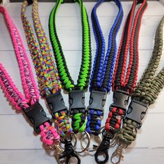 *What is it? - A custom made to order paracord lanyard featuring a breakaway buckle and a clip at the bottom to carry things, most commonly being your car keys. I offer two types of breakaways: the first type is a Side Release Buckle. This version will NOT break apart when pulled on. The second type is a Safety Breakaway and this version will breakaway when pulled on.  *This listing has a two week processing time. Need something faster? -Check out my ready to ship lanyards here:  https://www.etsy.com/shop/jackofallbraids/?etsrc=sdt§ion_id=37133118 *Like the idea of custom ordering, but want a different braid? Check out my Shark Jawbone Braid Lanyards here:  https://www.etsy.com/listing/1473117334/paracord-lanyard-breakaway-shark-jawbone *Sizing? -My lanyards are based on standard lanyards Keychain Men, Knife Lanyard, Paracord Accessories, Paracord Ideas, Paracord Lanyard, Different Braids, Id Lanyard, Paracord Beads, Paracord Keychain