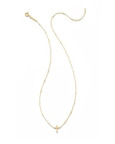 Sweet, symbolic, and soon-to-be a collection staple. The Delicate Cross Pendant Necklace in 14k Yellow Gold is a forever reminder of what matters to you most. Kendra Scott Cross Necklace, Kendra Scott Preppy, Kendra Scot, Kendra Scott Necklace Elisa, Sold Out Sign, Xmas Wishlist, Kendra Scott Necklace, Christmas Clothes, Gold Cross Necklace