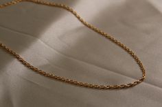 14k gold filled rope chain unisex gold chain available in different lengths Gold Twisted Rope Chain Necklace, 14k Gold-filled Jewelry With Figaro Chain, Minimalist Twisted Yellow Gold Jewelry, 14k Gold Link Rope Chain Necklace, Dainty Cuban Link Jewelry With Adjustable Chain, Minimalist Rope Chain Link Jewelry, Classic Rope Chain Necklace With Oval Link, Classic Oval Link Rope Chain Necklace, Classic 14k Gold Filled Gold Chain Jewelry