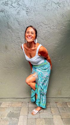 Let your style shine this summer with our Ella Boho Skirt! This lovely little number is perfect for sunny summer days and long summer nights. The bright, cheerful colors are sure to put a smile on your face. The pink and teal paisley pattern comes alive with pops of lime green in the intricate detailed border. Whether you’re headed to a beach bonfire or going to the park with friends, this skirt will keep you looking stylish yet comfy. Crafted from lightweight and comfortable fabrics, its flatte Spring Paisley Print Beach Skirt, Hippie Tie-dye Skirt For Beach, Beach-ready Boho Print Tiered Skirt, Bohemian Tie-dye Maxi Skirt For Summer, Fitted Bohemian Tie-dye Skirt, Beach Bonfire, Boho Skirt, Boho Skirts, Paisley Pattern