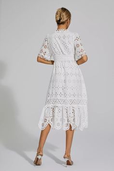 This elegant Aarya White Cut Out Midi Dress is a fusion of French styling and summer fashion. The dress features intricate embroidery and delicate lace detailing, adding a touch of sophistication. With its mid-length design and white color, this dress is perfect for any occasion. Step out in style and make a lasting impression with this beautiful dress.  Dress Length: Approx 128cm Materials: Polyester Gentle Dry Clean Only  The model is 5 ft 7 and wears size S  Color may vary due to lighting on Silver Sequin Top, Glitter Wedding Dress, Cut Out Midi Dress, Total White, Bandage Midi Dress, Floral Shirt Dress, Puff Sleeve Dresses, Maxi Knit Dress, Intricate Embroidery