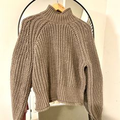 Gorgeous Heavy Knit Crop Sweater!! Never Worn! Love This Color! It Just Goes With Everything! Just Hanging In Closet! Size Medium And Super Stretchy. It’s Sorta Olive/Gray Cozy Beige Knit Knitting Pattern, Cozy Beige Knitting Pattern, Cozy Knit Cropped Sweater For Fall, Cozy Fit Cropped Sweater For Winter, Cozy Textured Knit Pattern For Fall, Cozy Chunky Knit Cropped Sweater, Cozy Brown Cropped Soft Knit Sweater, Cozy Brown Soft Knit Cropped Sweater, Textured Knit Cozy Sweater