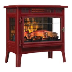 a red wood burning stove with flames in the front and side panels on both sides