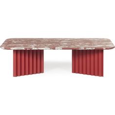 a red and white marble top table with metal columns on the sides, against a white background