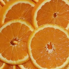 orange slices are arranged on top of each other