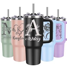 the monogrammed tumbler mugs are available in multiple colors and designs, including one with an initial