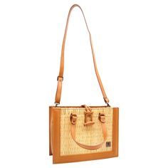 Product Description Classic but bold, this straw handbag is crafted with organic reed allied with vegetable tanning leather details, making it a timeless bag. Handmade using traditional Portuguese woven methods, by a family of master artisans, this is a masterpiece that unites old-world weaving techniques with a modern look. Designed so that you can make the most of your day-to-day life. Take it to the office or on a date and be assured that your outfit will pop from the others. Its removable sh Natural Satchel With Braided Handles, Natural Rectangular Satchel With Braided Handles, Summer Natural Satchel With Bamboo Handle, Natural Satchel With Bamboo Handle For Summer, Natural Color Summer Satchel With Bamboo Handle, Natural Color Travel Satchel With Bamboo Handle, Rectangular Woven Leather Straw Bag For Travel, Handwoven Rectangular Satchel For Vacation, Natural Tote Satchel With Bamboo Handle