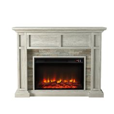 an electric fireplace with the fire burning in it