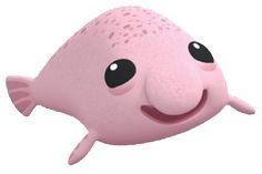 a pink toy with black eyes and a smile on it's face is floating in the air