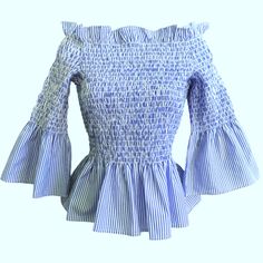 Joseph Ribkoff Smocked Blouse. Off Shoulder. Flared Bell Sleeves. Peplum Hem. Ruffled Neckline. White & Blue 65% Polyester, 35% Cotton. Tagged Size M. Bust: 14-18"X2 Flat Across Underarms Length: 22" Condition: Preowned. Great Condition. No Stains/Holes/Rips. Wsbin Oz P1430388p Geminitiger7dez Flattering Fit Flare Casual Comfort Lounge . Brand New To Poshmark? Enter Code Geminitiger7 At Checkout For $10 Off Your First Purchase Chic Bell Sleeve Top With Ruffle Hem, Spring Bell Sleeve Top With Ruffle Hem, Smocked Blouse, Spring V-neck Peplum Top With Ruffle Hem, Smock Blouse, Ruffled Neckline, Joseph Ribkoff, Peplum Hem, Bell Sleeve