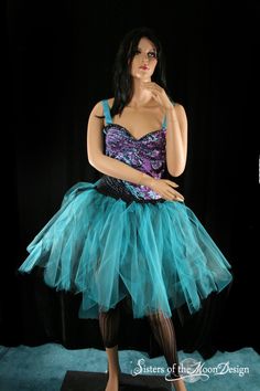 "Handmade from 100yard strips of soft smooth turquoise and black Bridal tulle, that has been gathered and serged to the soft black fabric waistband. This tutu is sewn not tied! LENGTH 20\" long tutu can also be scrunched up as shown in the last photo. The small pieces allows you to make it crazy looking if you want to. All you have to do is run your fingers to comb straight or fluff it up. Just remember even though this tutu is long it still can be sheer, so if your not daring were something und Fitted Halloween Party Petticoat, Summer Fancy Dress Fitted Tutu Dress, Halloween Party Tulle Petticoat, Fitted Rave Costumes For Carnival, Fitted Halloween Dance Dress, Fitted Petticoat For Halloween Costume Party, Fitted Tutu Dress For Summer Costume, Fitted Summer Costume Tutu Dress, Party Petticoat With Attached Cancan In Balletcore Style