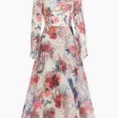 a floral print dress with long sleeves