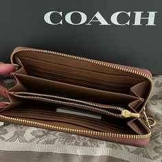 This Listing Is For The Coach Wallet! Zipper Closure With Hand Strap! Zipper Compartment Inside! Twelve Card Holders! Two Bill Compartments! Coach Leather Wallets With Zipper Closure, Coach Clutch With Zipper For Daily Use, Coach Wallets With Zipper Closure For Everyday Use, Coach Wallets With Zipper Closure, Chic Coach Wallet With Zipper Closure, Coach Travel Wallet With Zipper Closure, Coach Travel Wallets With Zipper Closure, Coach Wallets With Zipper Closure For Travel, Slim Calves