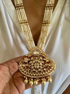 RESTOCKED  All our pieces are in stock and will be dispatched within 24 to 48 hours of order. Orders received during the weekend will be dispatched on Monday. The white and green beads strings on both sides of an elegant Kundan pendant make it a statement wedding necklace. One of our favorite picks for the wedding season ❤️ Dimensions Weight of the necklace: 78 grams Drop Length of the necklace: 12 inches Height of pendant: 3.5 inches Width of pendant: 3 inches Weight of earrings is 46 g per pai Elephant Bangle, Statement Earrings Wedding, Stone Necklace Set, Bridal Necklace Set, Kundan Necklaces, Antique Necklace, Bead Stringing, Wedding Jewelry Sets, Bridal Necklace