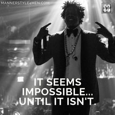 a man in a tuxedo with his hands up and the words it seems impossible until isn't