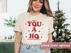 You A Ho Funny Shirt , HO HO HO T shirt, Christmas Pun Shirt, Funny Christmas Shirt, Santa's Hos Tee, Funny Santa tshirt, Ho Ho Ho shirt Ho ho ho! This funny Christmas shirt is perfect for anyone who wants to spread some holiday cheer this season. Whether you're celebrating Christmas or just looking for a punny shirt to wear, this shirt is sure to put a smile on your face.  ♡ TEE DEETS:  * Unisex Adult Sizing * 100% Soft Airlume combed and ring-spun cotton (Heather Colors are 52% Airlume combed and ring-spun cotton & 48% polyester) * Lightweight  * Tear away label *Rolled sleeves in photos are for styling purposes only, but sleeves are long enough to be stylishly rolled up. * Any props used in our photos are for styling only and NOT included with the purchase * All designs are chosen with Calling All You Ho Ho Hos, Inappropriate Christmas Shirts, Pajama Brunch, Funny Christmas Shirts For Women, Punny Shirt, Santa Tshirt, Pun Shirt, Christmas Puns, Pun Shirts