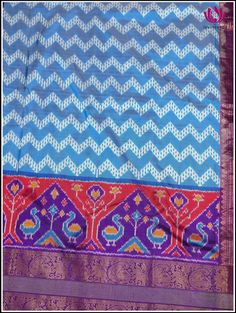 Step into this charming elegance of Kanchipuram Silk light blue saree, festooned with Ikkat pattern on its body. The blue foundation displays distinctive ikkat pattern, creating an unique and stunning look. Further it snuggled across the purple border featuring animal motif series that radiates zest for life. The vibrant purple pallu with animal motis in florals, woven in gold zari exudes perfect grandeur. The saree is accompanied by ikkat purple zari-bordered blouse, which adds opulence. Silk m Blue Silk Pre-draped Saree For Traditional Ceremonies, Blue Paithani Silk Pre-draped Saree With Traditional Drape, Traditional Blue Pre-draped Saree For Festivals, Blue Art Silk Pre-draped Saree With Traditional Patterns, Transitional Blue Silk Pre-draped Saree, Blue Pre-draped Saree With Zari Weaving For Navratri, Blue Pre-draped Saree With Motifs For Festivals, Blue Saree With Printed Border, Traditional Blue Handloom Pre-draped Saree