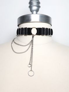 "* Satin elastic choker decorated with small rings, adjusters and removable chains * Entirely handmade and made to order in France * The elastic band (made in France) measures 18mm / 0.70\" wide * The chains are made of stainless steel. You can wear this choker with or without the chains for two different styles. * A hook at the back allows to open and close the necklace * Two sliders at the back for easy size adjustment * Available in red, black, white and pastel pink * The metal parts and chains are available in silver or gold color * Do not hesitate to ask for a custom size if you wish! * Tracked shipment The color of the item may be slightly different from the photo. Feel free to send me a message if you have any questions!  Matching brooch: https://www.etsy.com/ForvitniFr/listing/1058 Pink Bead Necklace, Pisces Necklace, Day Collar, Rose Pastel, Body Harness, Small Rings, Pink Beads, Ceramic Jewelry, Chain Choker