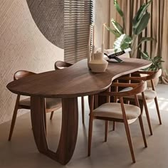 a wooden table with chairs around it