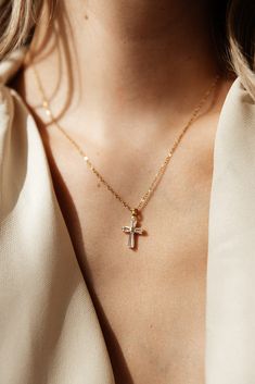 Maximize your style with the Ophelia Diamond Cross Necklace - a statement piece that is both water and tarnish resistant. Perfect for stacking, this beautiful cross necklace will take your look to the next level. Crafted with care, so you can make it an everyday staple. MATERIAL: 18k PVD Gold plated, Stainless steel, Cz LEGNTH: 18" Water resistant, tarnish resistant, hypoallergenic, & nickel/lead free. Luxury Elegant Cross Necklace, Vintage Gold Cross Necklace, Wedding Cross Necklace, Cute Cross Necklace, Cross Necklace Aesthetic, Gold Cross Necklace For Women, Gold Diamond Cross Necklace, Diamond Cross Earrings, Pearl Cross Necklace