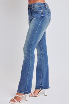 Slide into this denim like he does your DMs. Our Women’s WannaBettaButt Mid Rise Boot Cut Jeans made with recycled fibers will have you feeling too hot to handle. Part of our WannaBettaButt collection, these pants feature our famous heart-shaped stitching and perfectly placed pockets for a contouring look that lifts and enhances your natural curves. Constructed with midweight denim, this mid-waisted jean is fitted hip to knee with a subtle boot flare at the hem. Made with recycled material because earth is bae <3 Style with a baby tee and cowboy boots for a rocking good time! Product Details - Mid-Rise- Front Zip Fly with Single Button Closure - Classic 5-Pocket Construction - Boot Cut - Full LengthSize & Fit (based on size 5)- Inseam: 33”- Rise: 9”- Leg Opening: 18”Machine wash cold, sepa