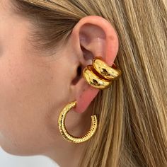 Be bold and be daring with the Becca ear cuff! This chunky, stackable gold ear cuff will add a stylish touch to your look. Step up your style game and take your outfit to the next level with this statement piece. 20 mm 18K Gold Plated over Stainless Steel Hypoallergenic Water & Tarnish Resistant Luxury Gold Plated Elegant Ear Cuff, Luxury Gold Plated Ear Cuff, Trendy Gold-plated Yellow Gold Ear Cuff, Elegant Hypoallergenic Gold-plated Ear Cuff, Luxury Gold-plated Gold Ear Cuff, Dope Jewelry Accessories, Gold Ear Cuff, Dope Jewelry, Ear Jewelry