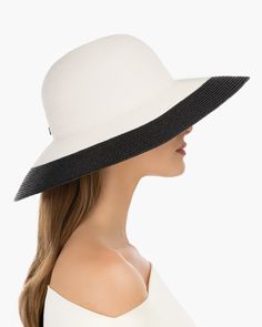 A versatile women's skimmer of our patented Squishee® packable straw with a contrast border which frames the face. Eric's desire to create a simple, striking sun hat that would take you from morning to sun down, resulted in this design. Whether you are strolling the beach or attending a pool-side brunch, you will look your best and have the security of protecting your skin. The Francoise rollable hat for sale online looks good on almost everyone and offers advanced sun protection, durability and Chic Packable Sun Hat For Vacation, Chic Packable Straw Hat For Vacation, Chic Straw Hat With Uv Protection For Travel, Chic Packable Straw Hat For Summer, Chic Summer Straw Hat Packable, Elegant Lightweight Straw Hat For Vacation, Modern Beach Hats For Spring, Modern Beach Hats For Summer, Modern Summer Beach Hats