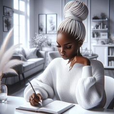 a woman sitting at a table with a book and pen in her hand while writing