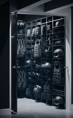 Gear Closet Organization, Weaponsmith Aesthetic Black, Armory Aesthetic, Military Gear Organization, Gear Organization Ideas, Hidden Room Ideas, Tactical Room, Black Tactical Gear, Mafia House Aesthetic