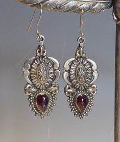 A fine vintage pair silver boho design long drop earrings. decorative silver raised pendant earrings set with a cabachon pear shaped cut real garnet. mounted with silver  shepherd hook fittings. drop length 6cm x 2.2cm wide.stamped 925 on backs. Pendant Earrings Set, Accessories Styling, Baroque Pearl Necklace, Set Earrings, Jade Earrings, Long Drop Earrings, Boho Design, Jade Carving, Boho Designs