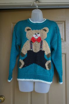 "Vintage hand knit sweater. Labeled as a size Medium. Made by Color Cues. Condition - has a snag -m see last photo. Measurements taken across front laid flat 24\" armpit to armpit 24\" length 18\" across waist -unstretched" Heavy Knit Sweater, Knitted Teddy Bear, Hand Knit Sweater, Womens Pullover Sweaters, Heavy Knit, Hand Knitted Sweaters, Pullover Sweater Women, Little White Dresses, Lace White Dress