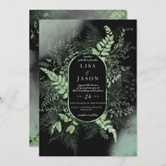 an elegant wedding card with greenery on the front and back, in black and green