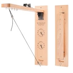 two wooden pendulums are attached to each other